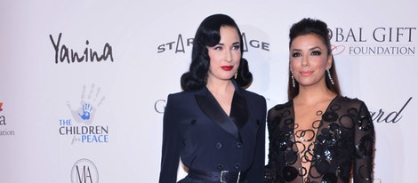 Eva Longoria y Dita Von Teese en la Global Gift Gala de Cannes 2013