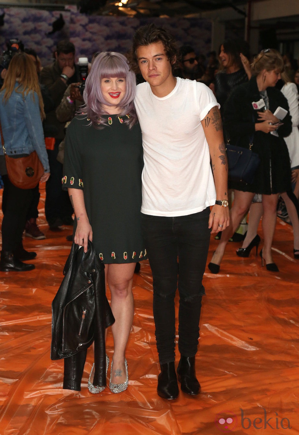 Kelly Osbourne y Harry Styles en la London Fashion Week 2013