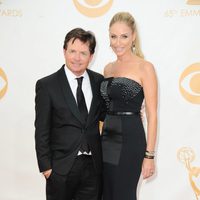 Michael J. Fox y Tracy Pollan en la alfombra roja de los Emmy 2013