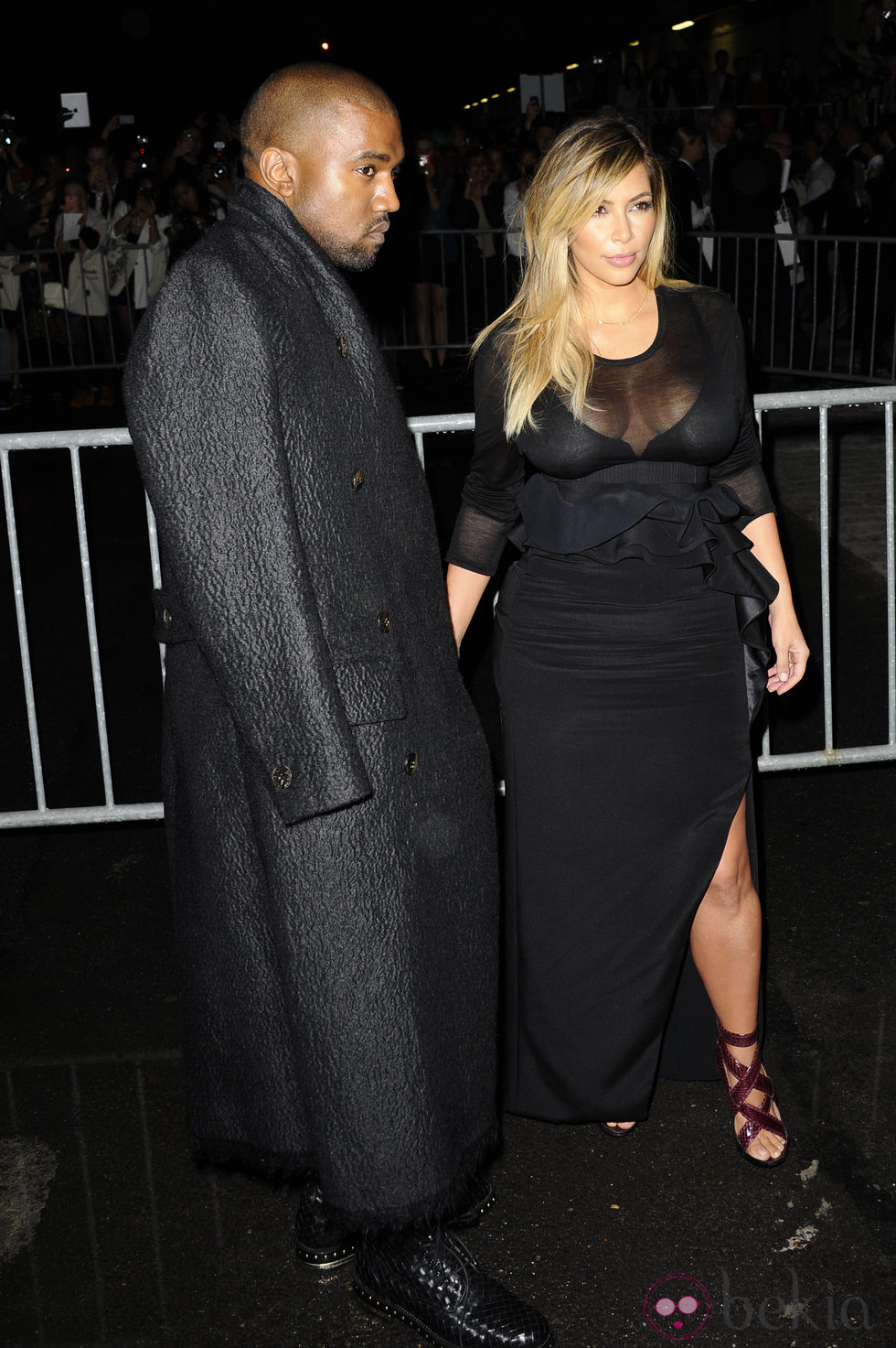 Kanye West y Kim Kardashian en el desfile de Givenchy en la Semana de la Moda de París primavera/verano 2014