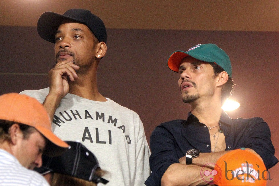 Will Smith y Marc Anthony viendo juntos un partido de fútbol americano en Miami