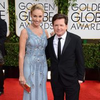 Michael J. Fox y Tracy Pollan en la alfombra roja de los Globos de Oro 2014