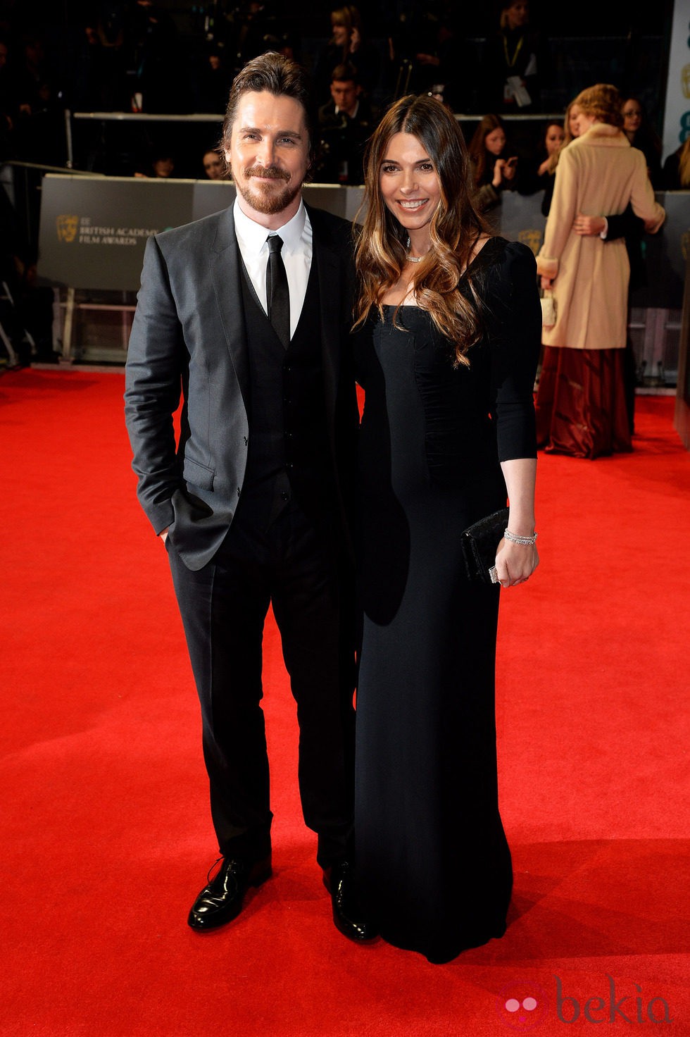 Christian Bale y Sibi Blazic en los BAFTA 2014