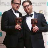 David O. Russell y Eric Warrensinger posan con su premio BAFTA 2014