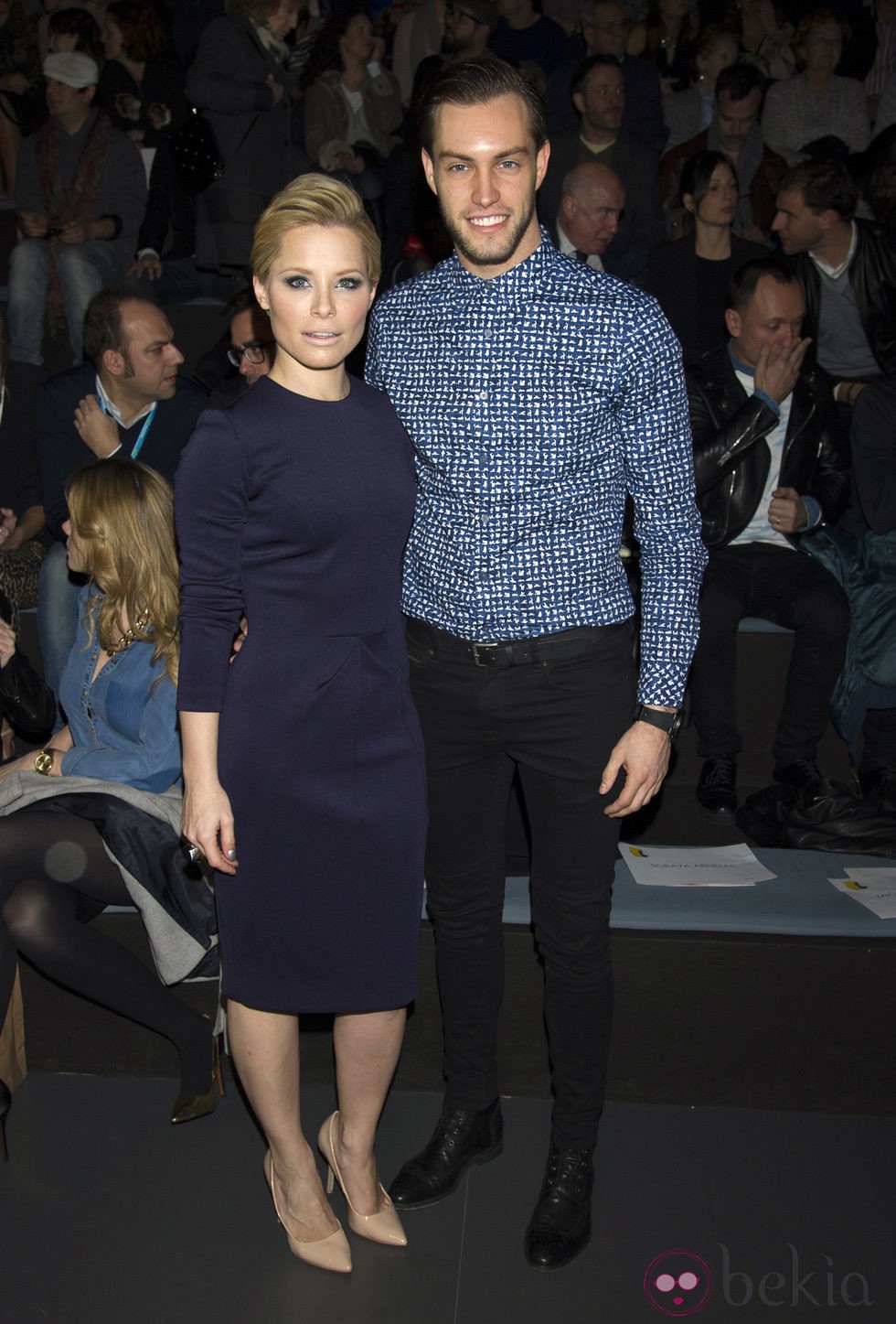 Soraya y Miguel Herrera en el front row de Juanjo Oliva en Madrid Fashion Week 2014