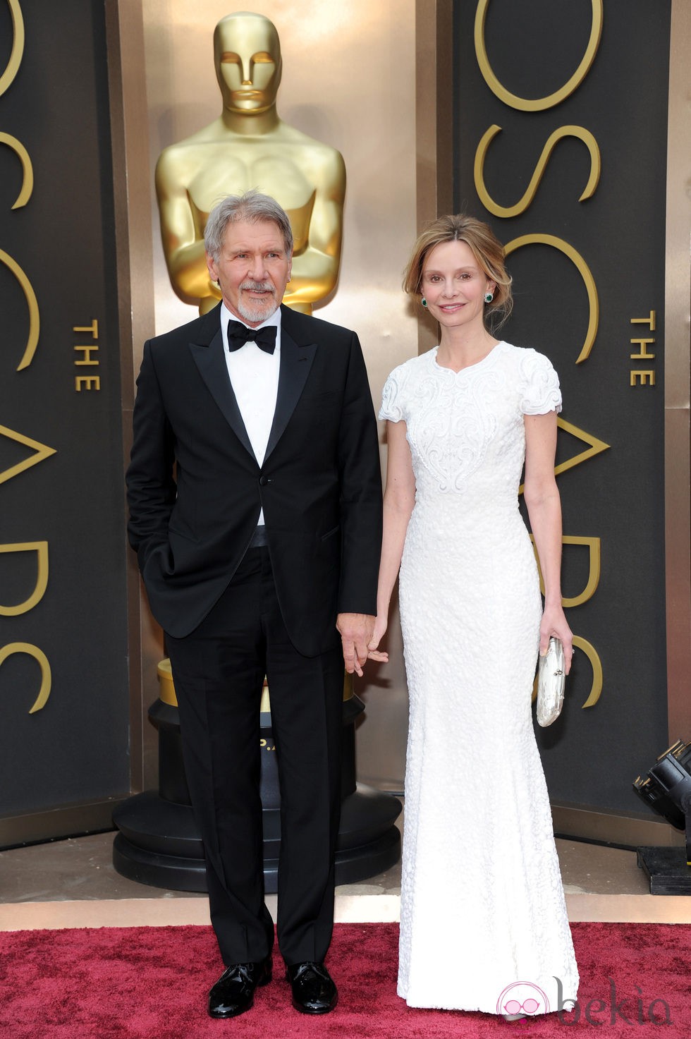 Harrison Ford y Calista Flockart en la alfombra roja de los Oscar 2014