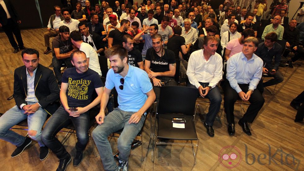 Xavi Hernández, Andrés Iniesta y Gerard Piqué en la despedida de Puyol del Barça