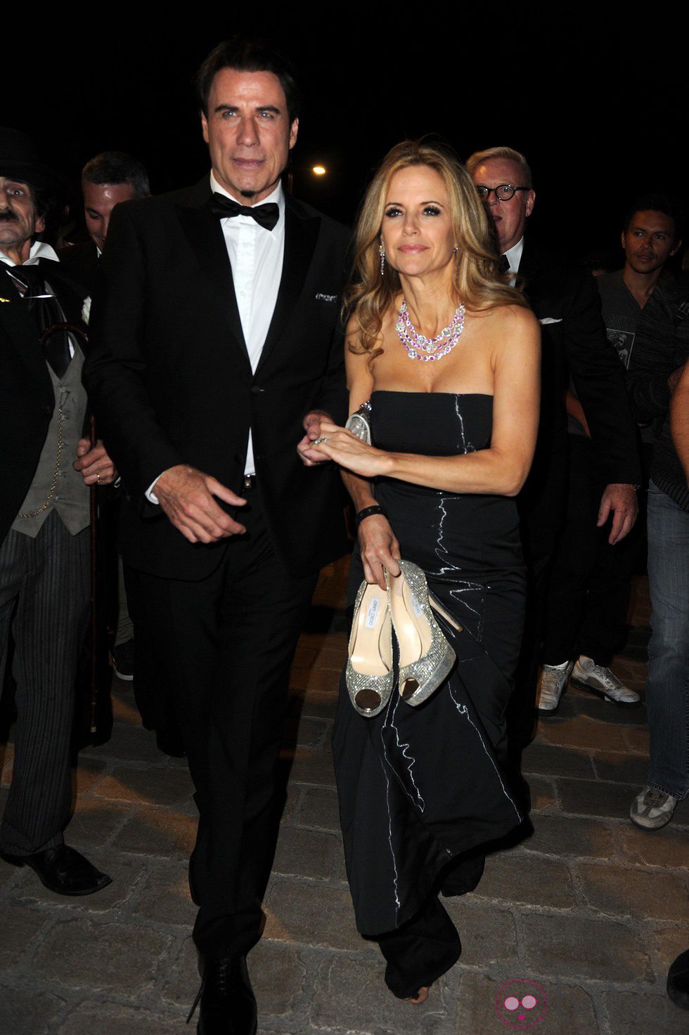 John Travolta y Kelly Preston en una fiesta en el yate de Roberto Cavalli en Cannes 2014