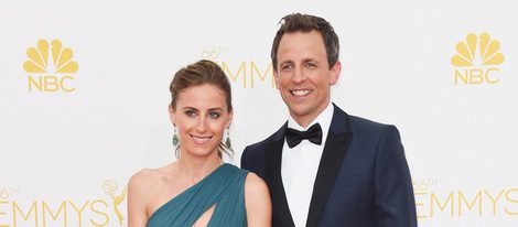 Alexi Ashe y Seth Meyers en la alfombra roja de los Premios Emmy 2014