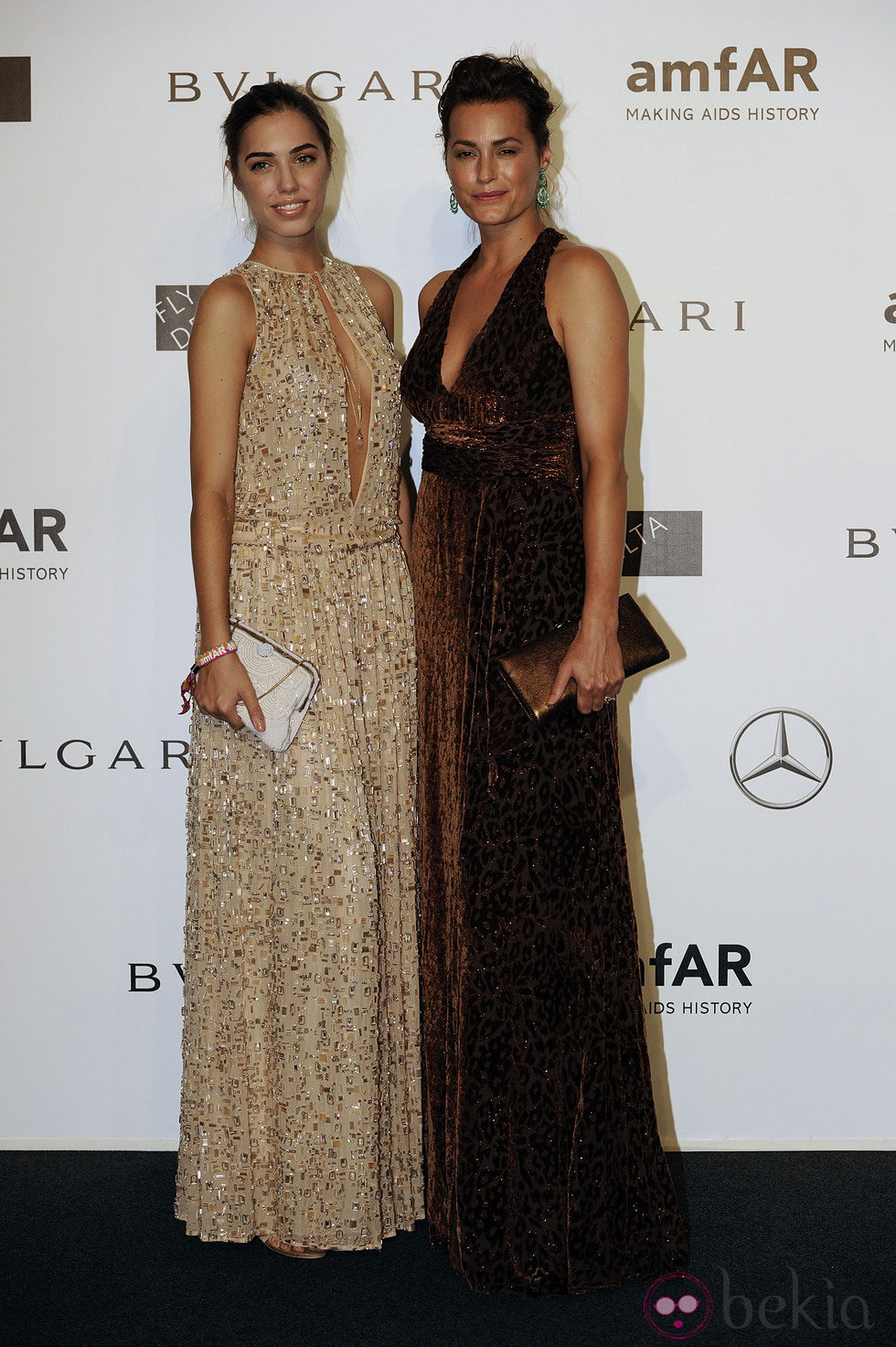 Yasmine Le Bon y Amber Le Bon en la cena benéfica de amfAR durante La Semana de la Moda de Milán 2014