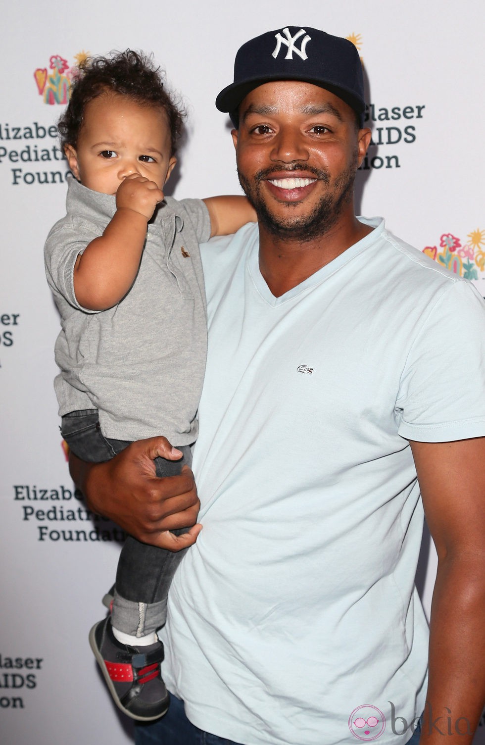 Donald Faison y su hijo Rocco en una gala benéfica por el VIH