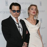 Johnny Depp y Amber Heard en la presentación de 'The Art of Elysium'