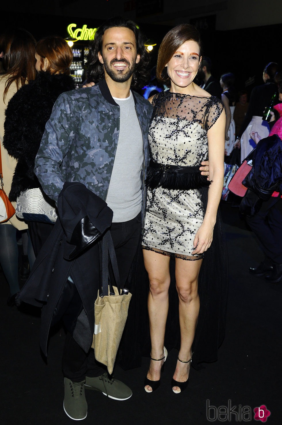 Matías Dumont y Raquel Sánchez Silva en el front row de Ion Fiz en Madrid Fashion Week otoño/invierno 2015/2016