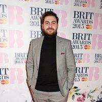 Andrea Faustini en la alfombra roja de los Brit Awards 2015