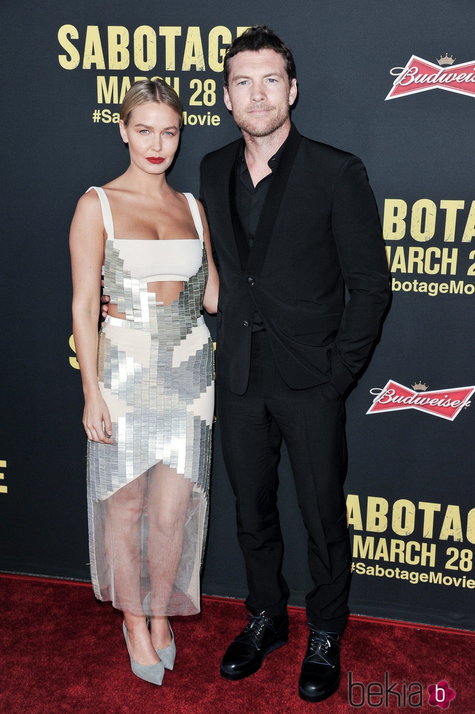 Sam Worthington y Lara Bingle en el photocall de una premiere