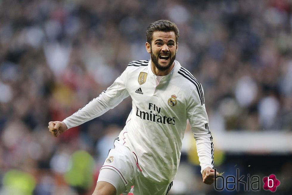 Nacho Fernández celebrando uno de sus goles con el Real Madrid