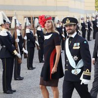 Los padrinos Natascha Aspenberg und Traun y el Príncipe Carlos Felipe en el bautizo de Nicolás de Suecia