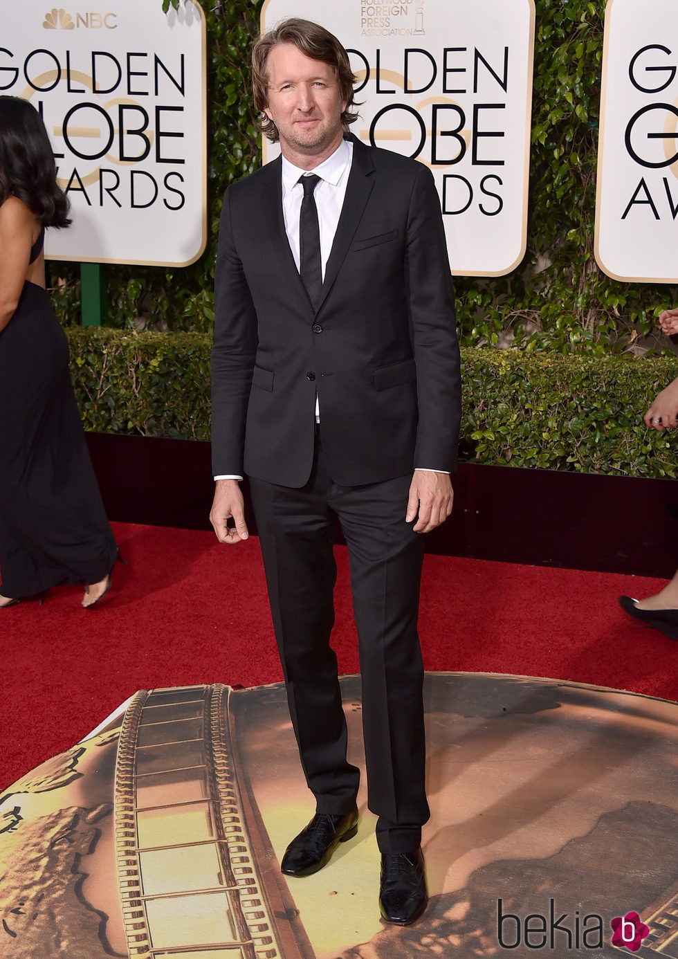 Tom Hooper en la alfombra roja de los Globos de Oro 2016