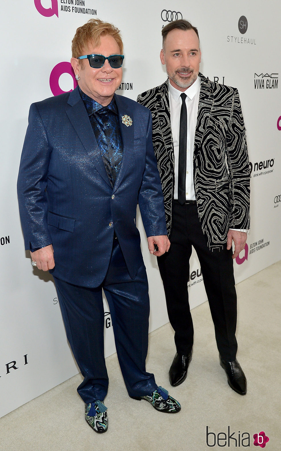 David Furnish y Elton John en la fiesta que organizan tras los Oscar 2016